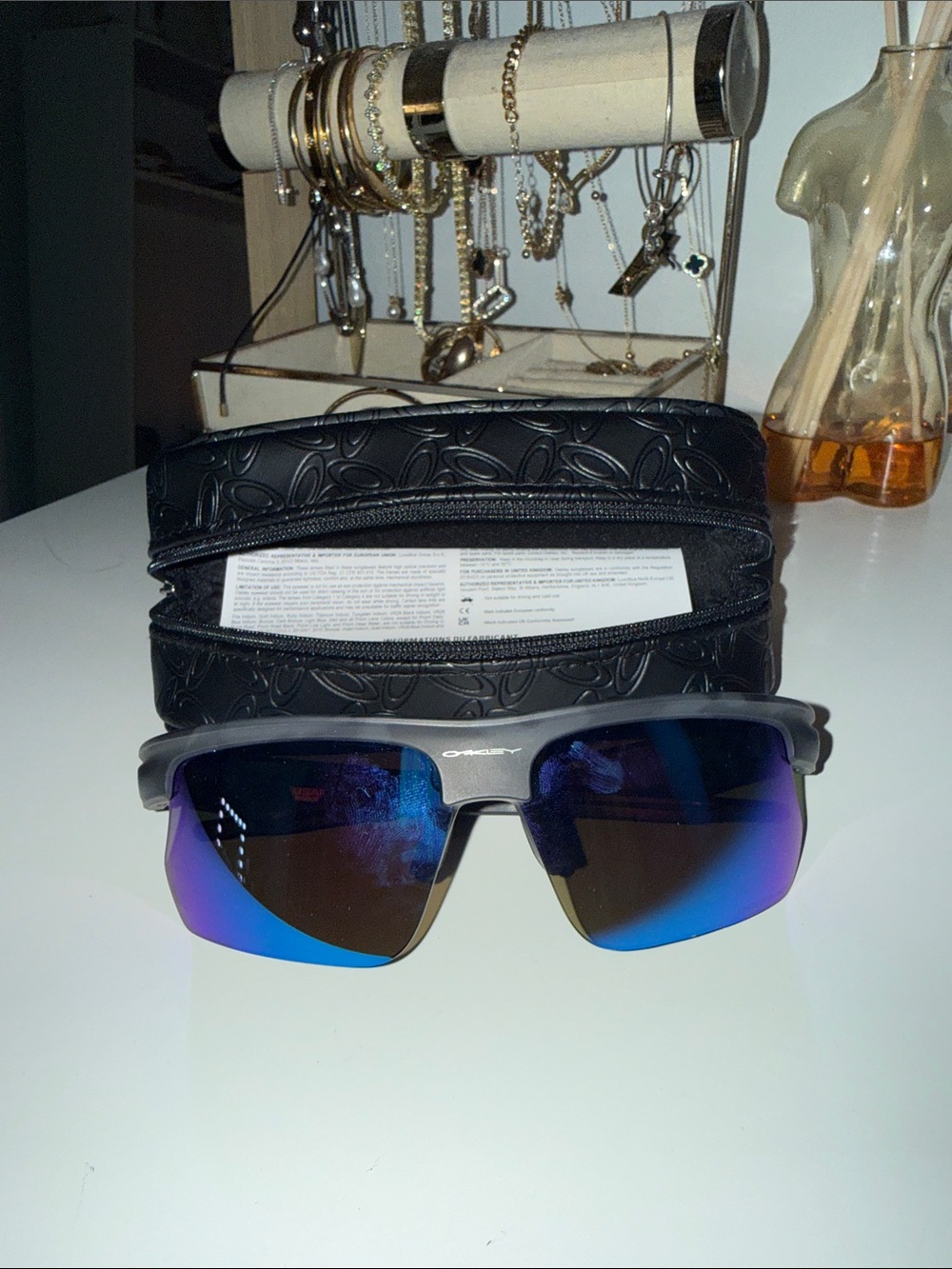 Oakley Men’s Gray Frame Sunglasses with Blue-Purple Mirrored Lenses